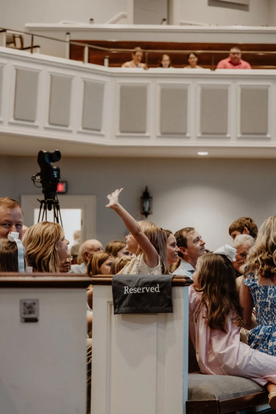 A hand raised during worship.