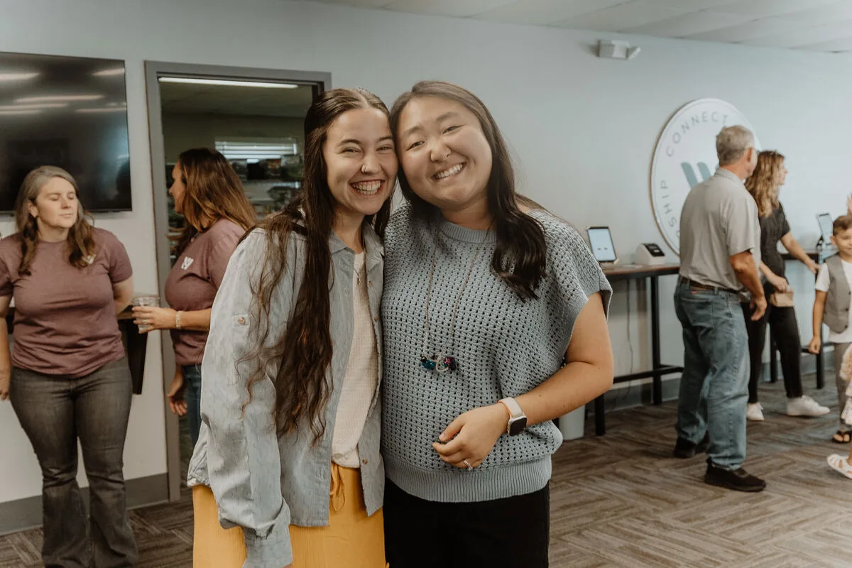 Two friends together after a service.