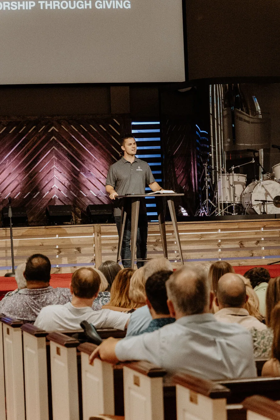 Teaching in front of the congregation.