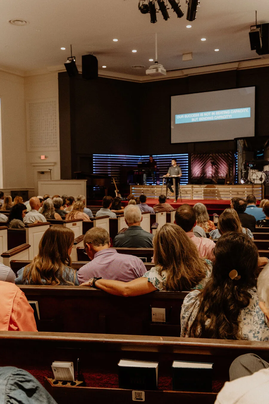 The congregation in the pews during a service.
