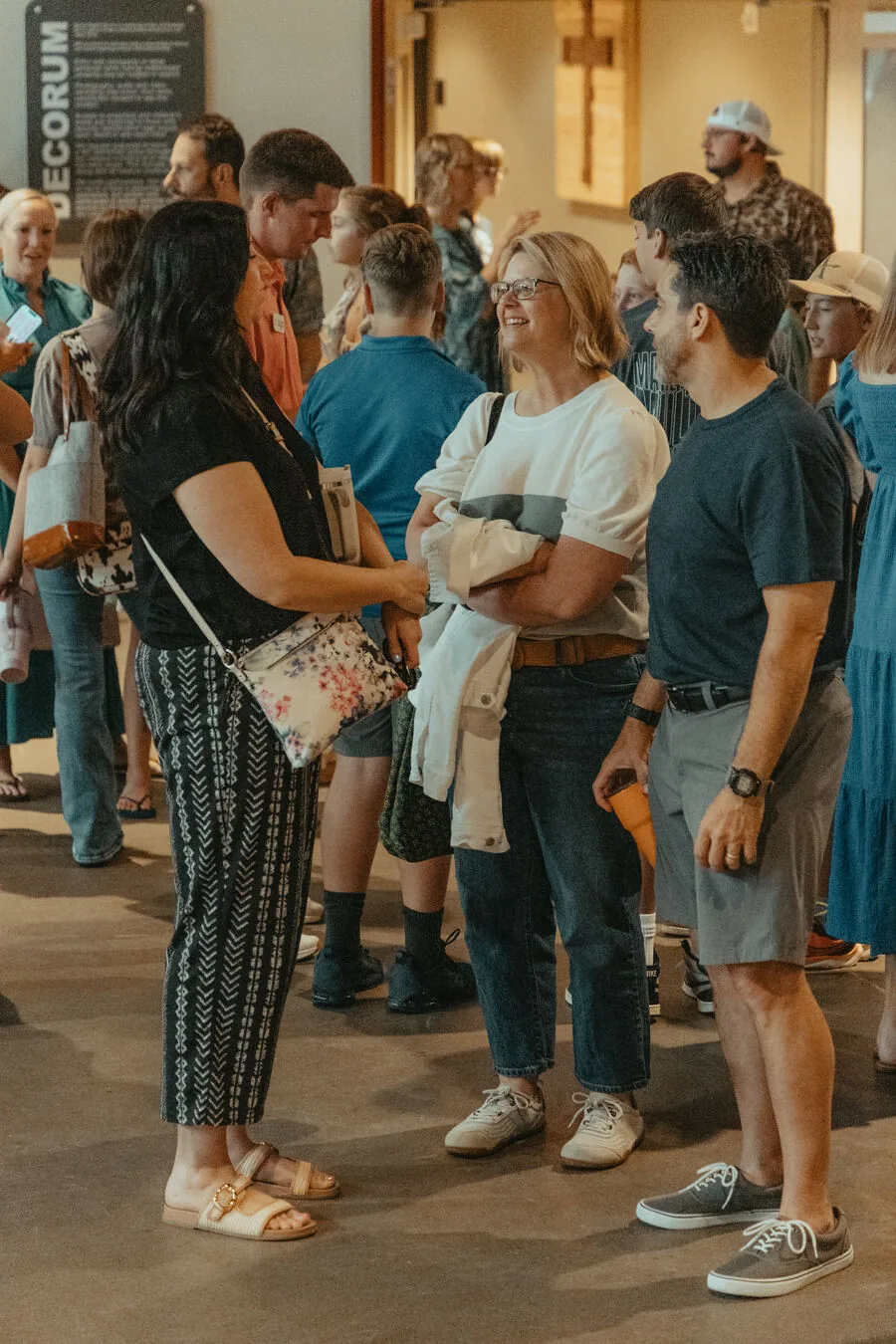 The room standing together during a service.