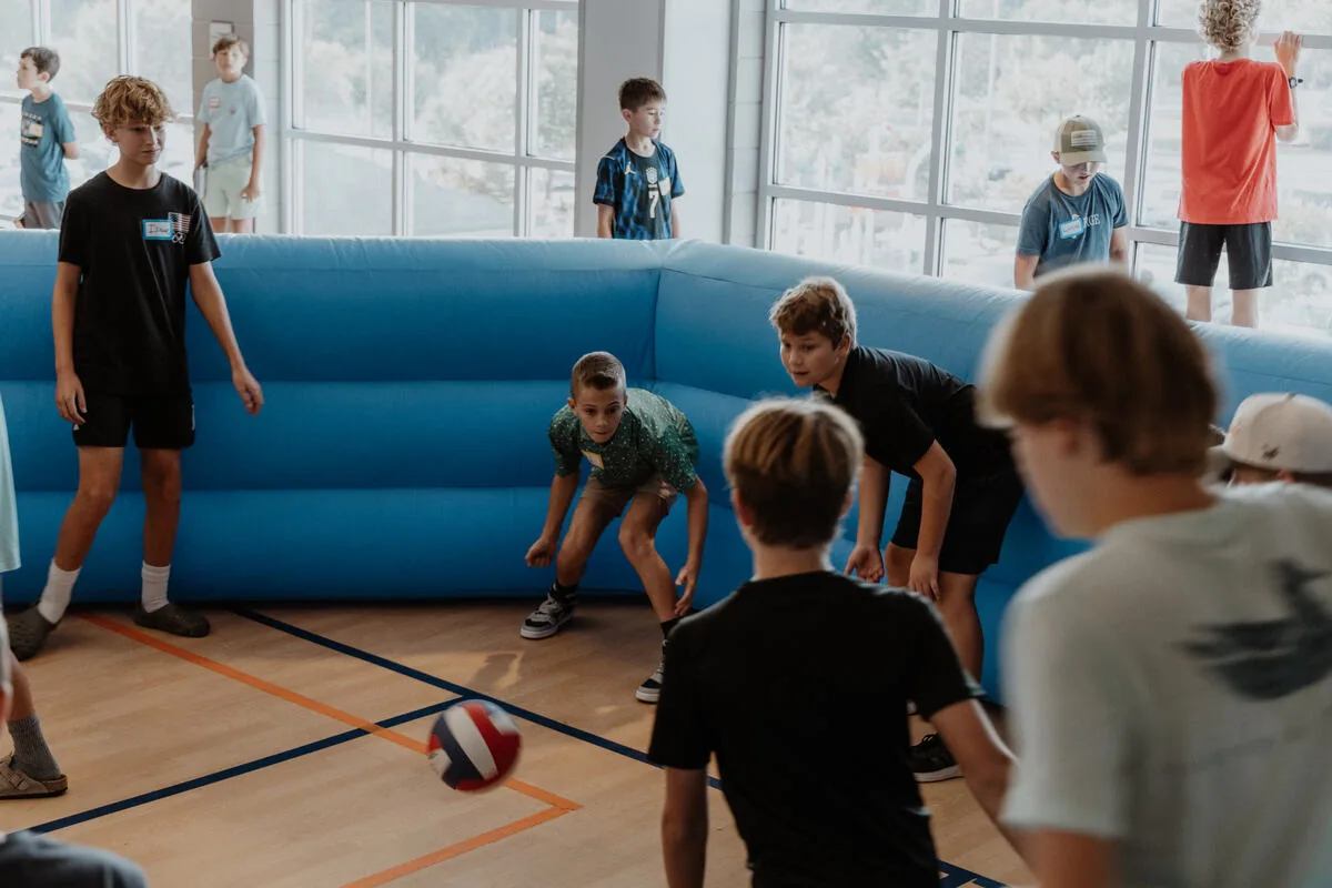 Students playing in the gym.