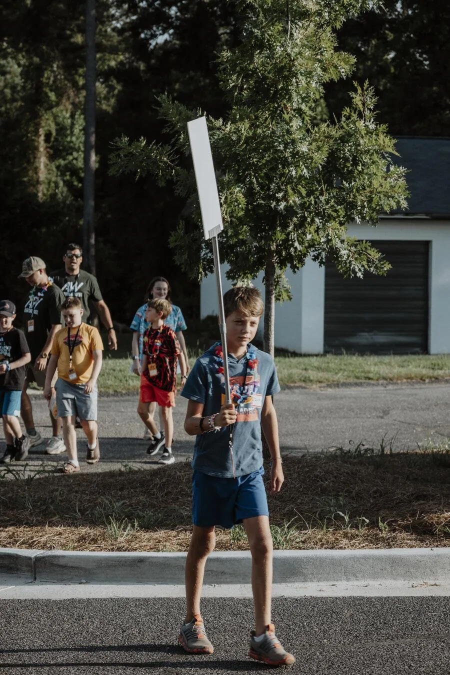 A child walking outside.