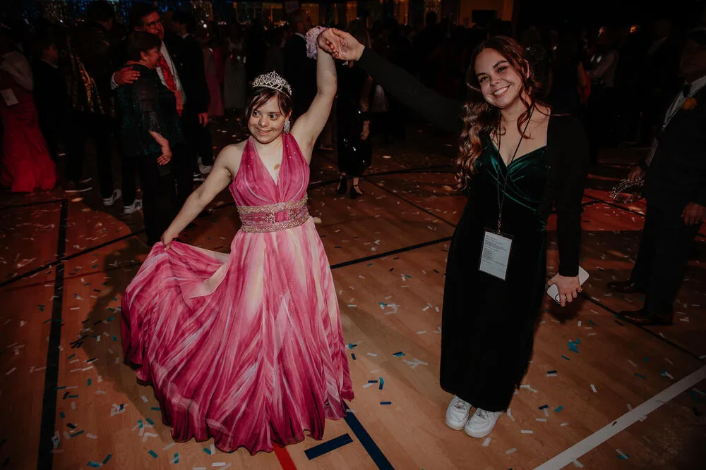A guest dancing in a pink gown.