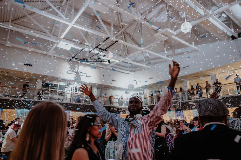 The room with hands in the air.