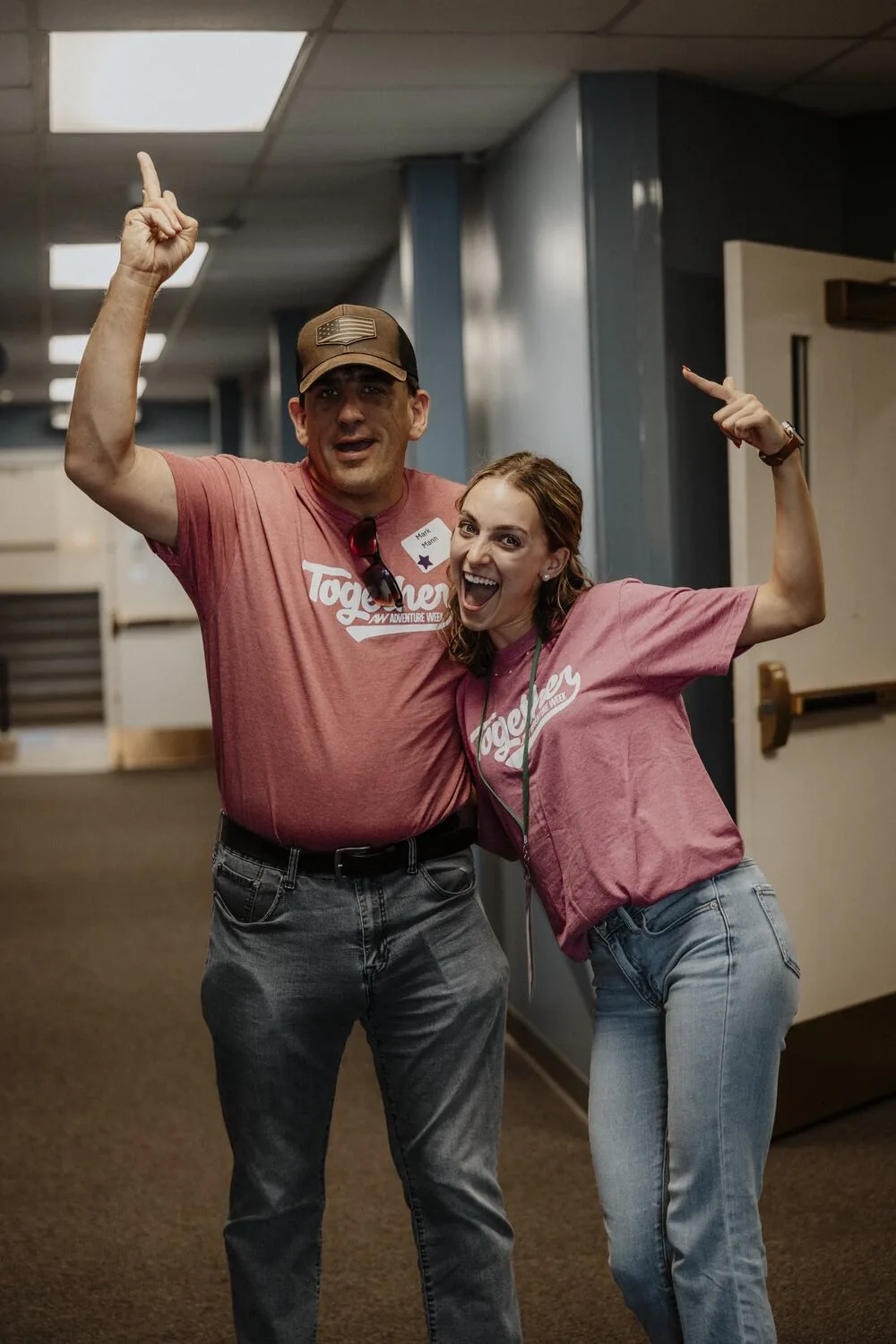 Two volunteers cheering.