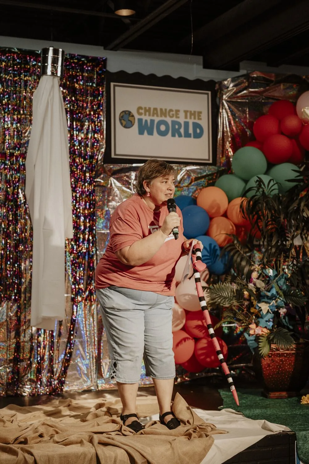 A leader on the decorated stage.