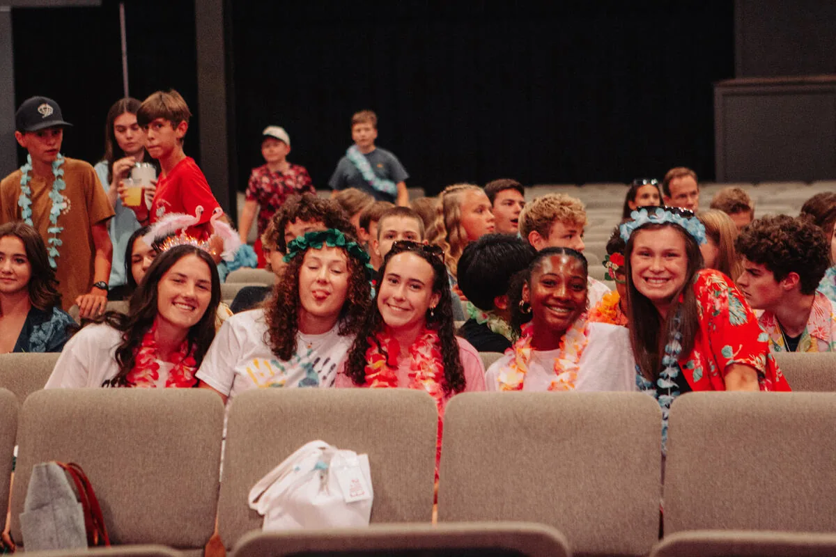 Rows of students in themed outfits.